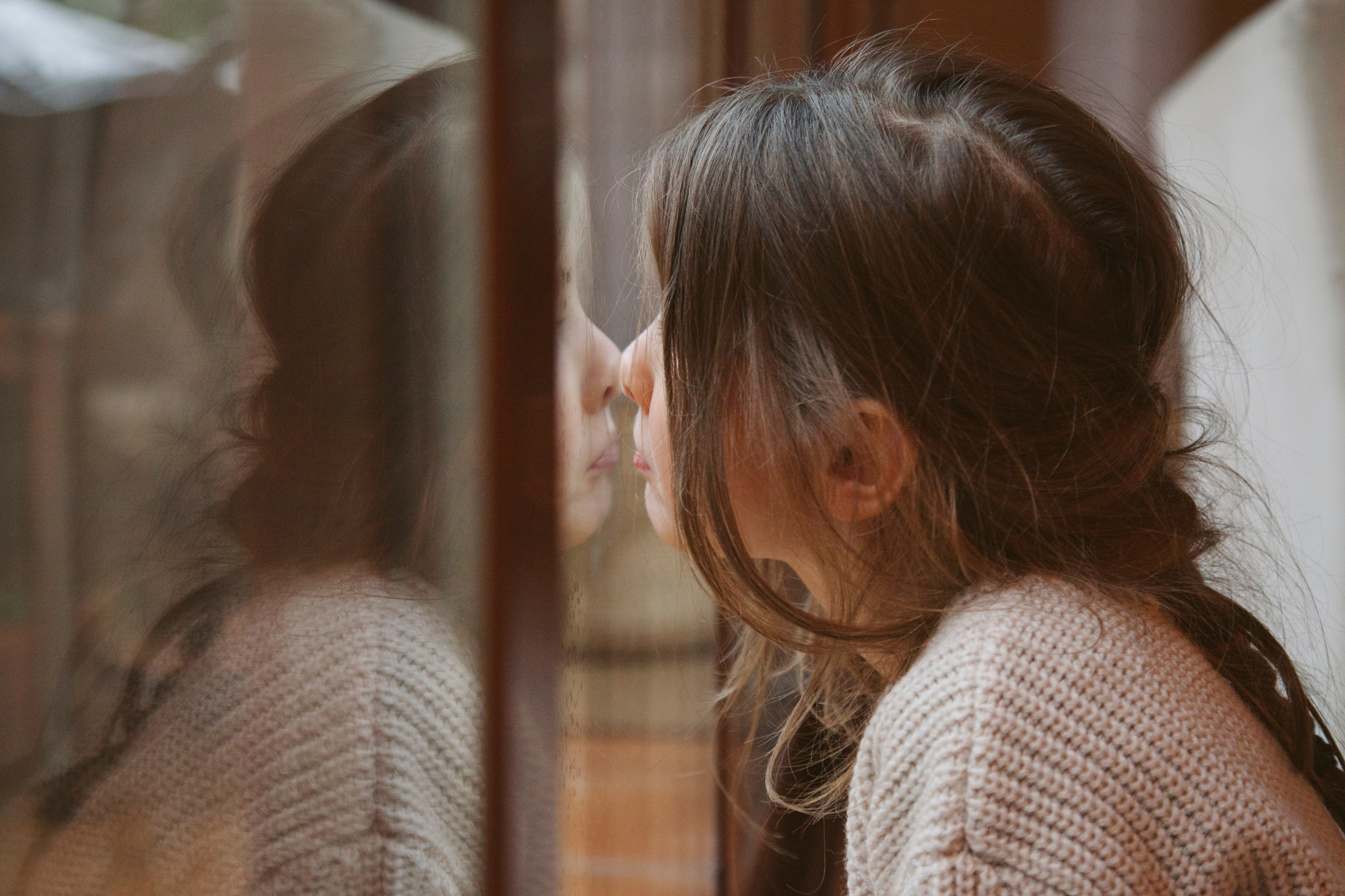Daughter Reflecting Sadness and Loneliness